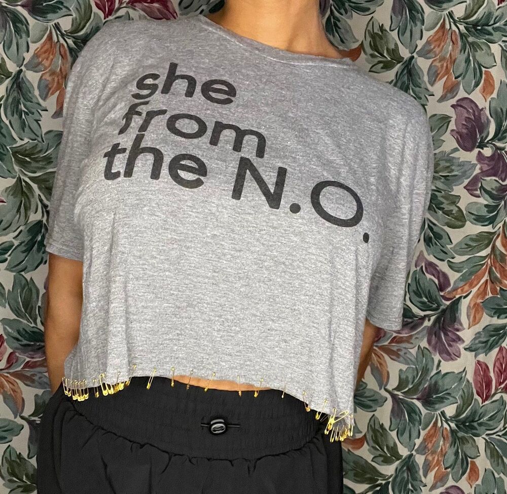 Grey “She From The N.O.” Crop Top with Gold Pins